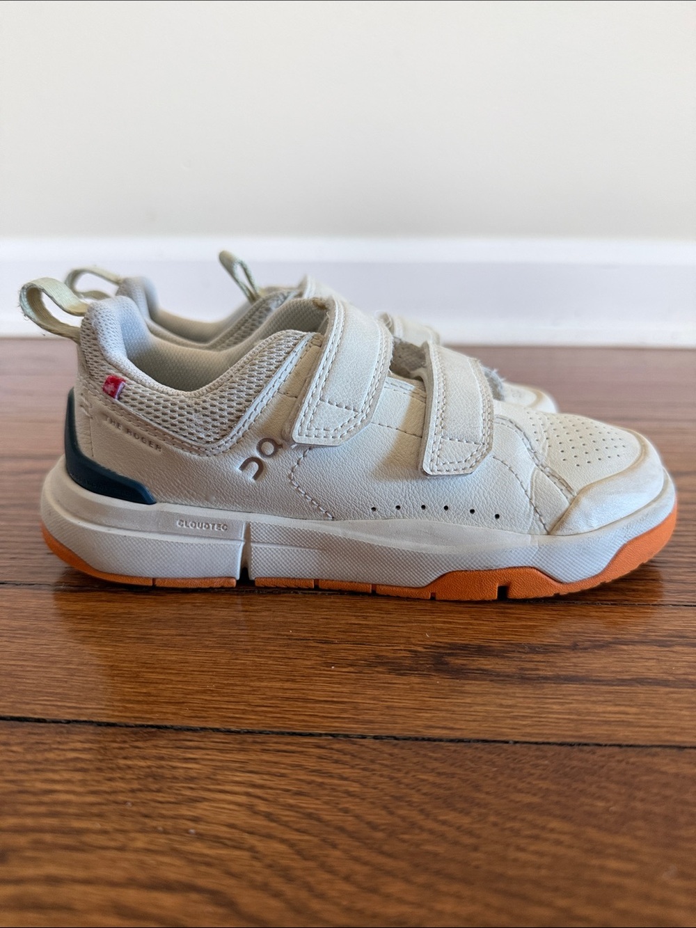 On Running Kids White Sneakers with Orange Outsole